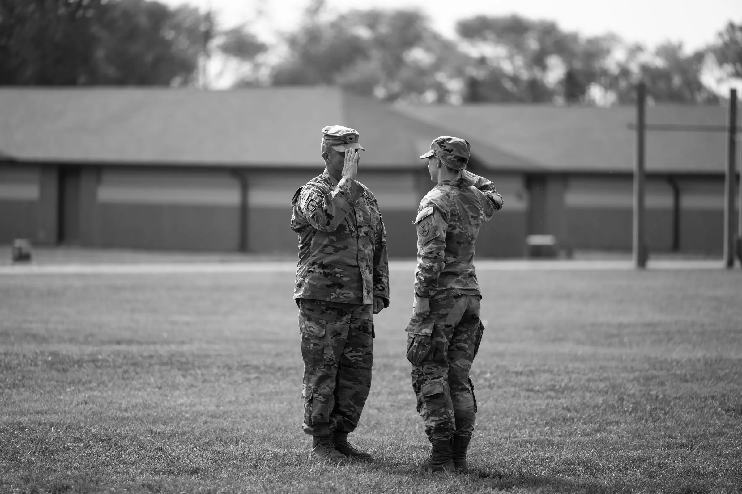 Two North Dakota Army National Guard Soldiers speaking during training